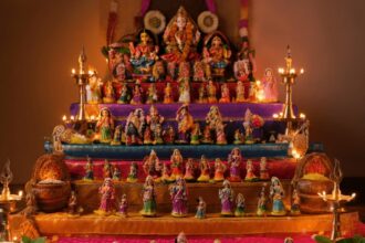 A traditional Tamil Nadu Navratri celebration scene featuring a Golu display with colorful dolls, surrounded by Naivedyam dishes like Sundal, Sweet Pongal, and Payasam.