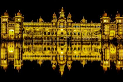Mysore Dussehra: Mysore Palace illuminated with festive lights during Dussehra celebrations, attracting thousands of visitors.