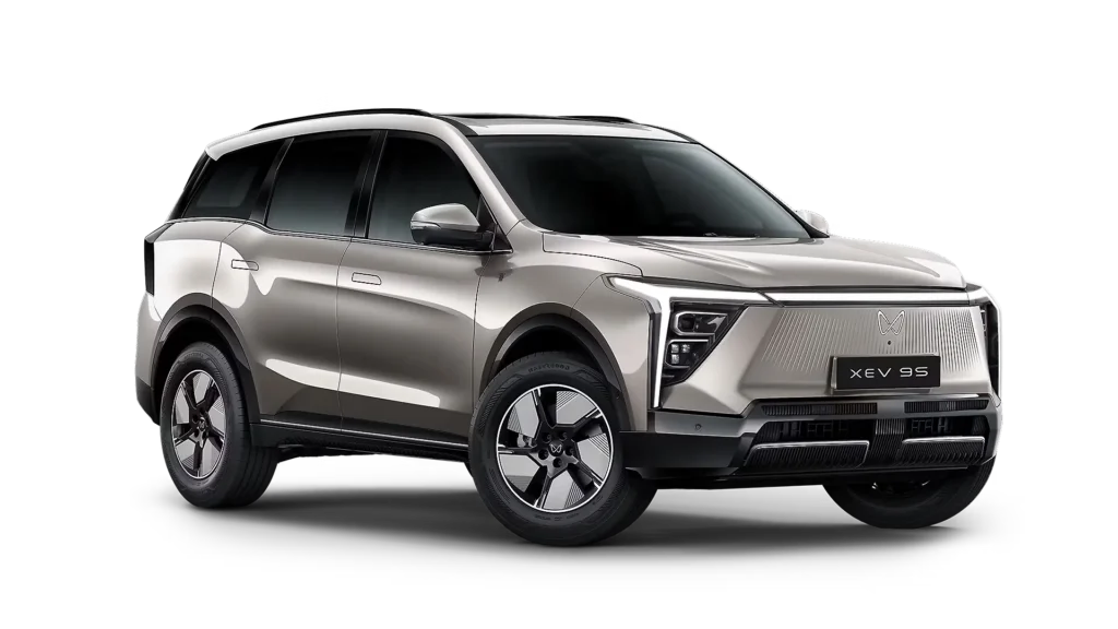 Mahindra XEV 9S review analysis: SUV showcasing its sleek LED headlights, modern aerodynamic lines, and metallic exterior finish.