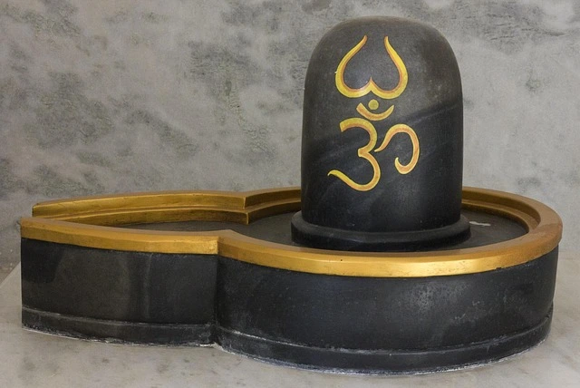 Shiva Lingam with golden Om symbol